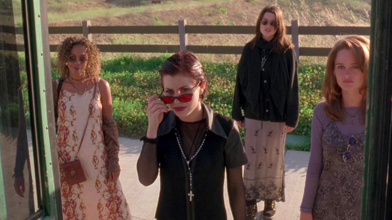 Rochelle, Nancy, Bonnie, and Sarah Stand Outside a Bus