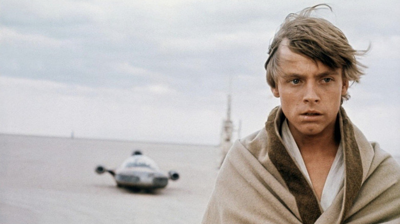 Mark Hamill as Luke Skywalker in Star Wars: A New Hope wrapped in a cloak