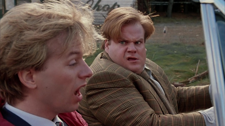 Tommy staring in shock at Richard in their car in Tommy Boy