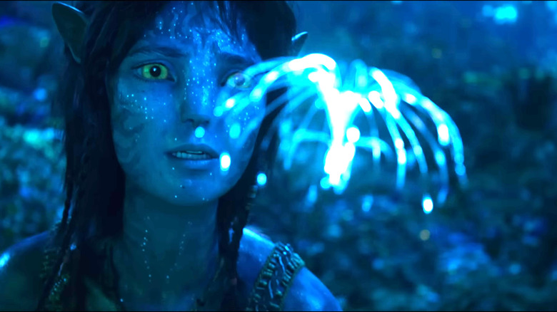 Avatar: Fire & Ash, Kiri looking at a glowing Eywa mushroom thing