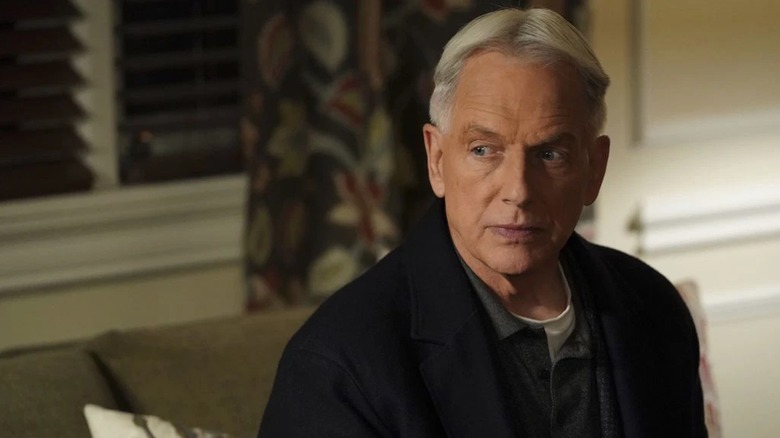 Mark Harmon sits in his living room as Leroy Jethro Gibbs in NCIS