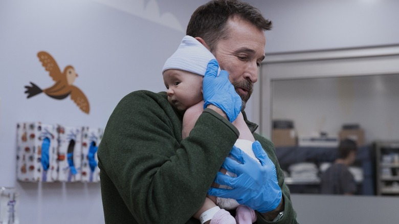 Robby holding a baby in season 2 of The Pitt