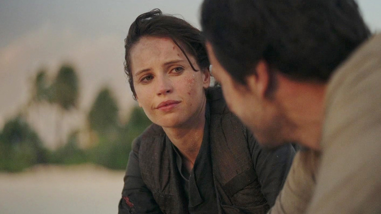 Jin and Cassian shares a thin moment on the beach in one Ragge