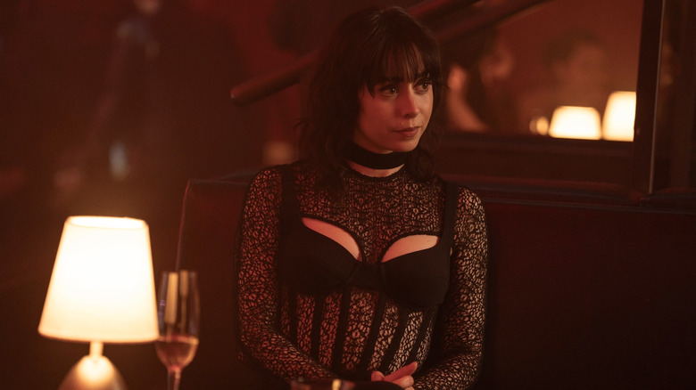 Cristin Milioti as Sofia Falcone sitting in a restaurant in The Penguin
