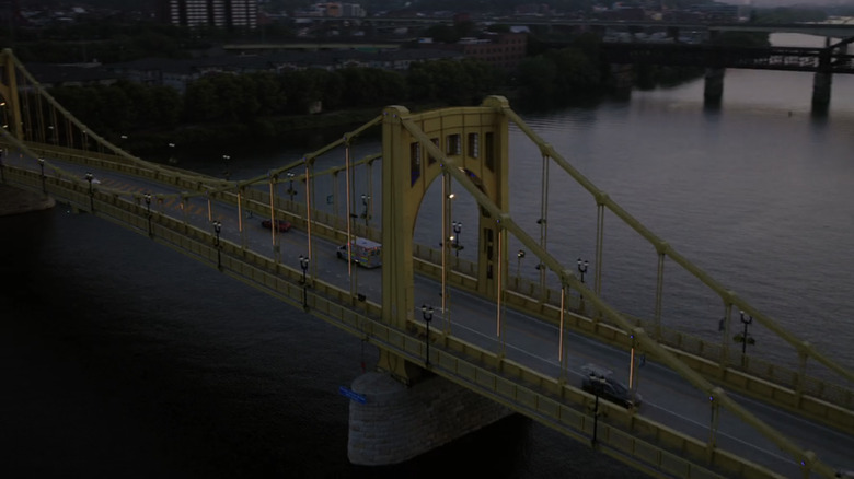 An Ambulance is shown crossing a Pittsburgh bridge in The Pitt