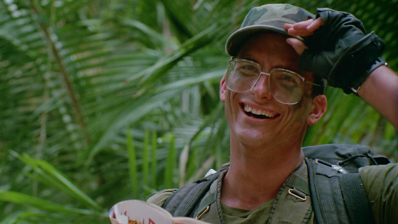 Shane Black as Hawkins tipping his hat in Predator