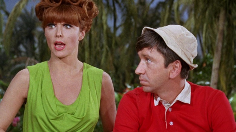 A nicely-dressed Ginger yelling something as Gilligan looks at her in Gilligan's Island.