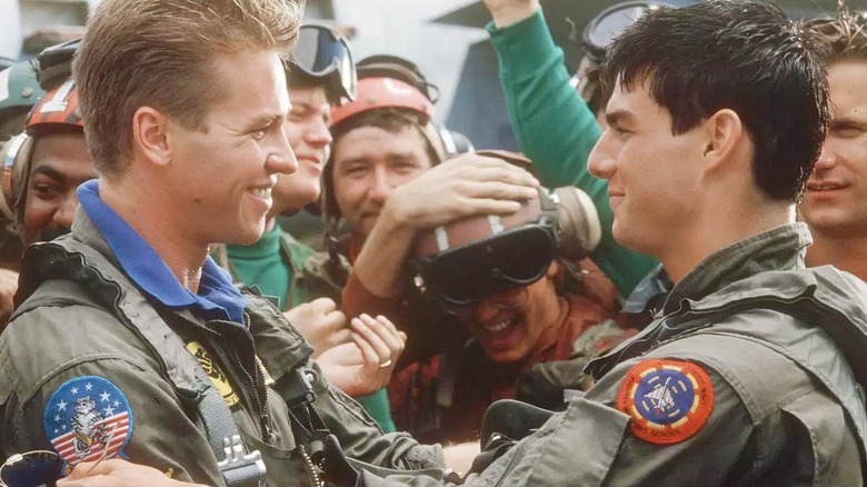 Iceman embracing Maverick in Top Gun