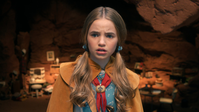 Holly looking scared in Max's cave in Henry's memories on Stranger Things