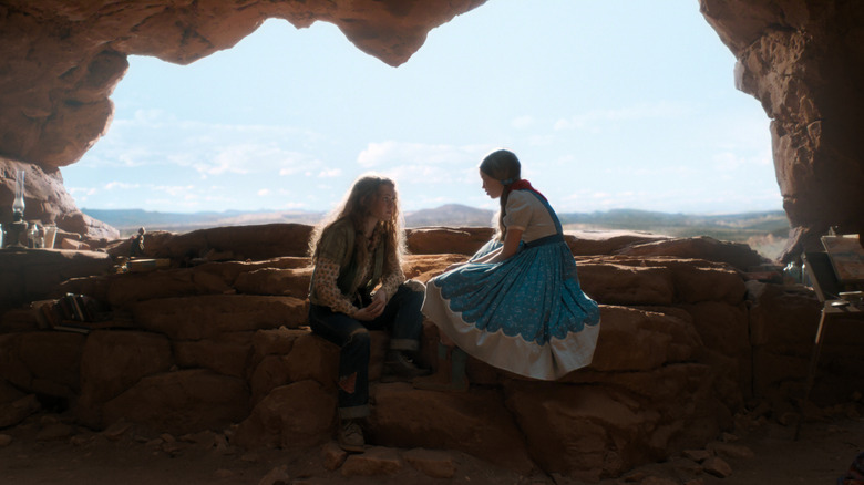 Max and Holly in the cave looking out at a desert in Stranger Things 5