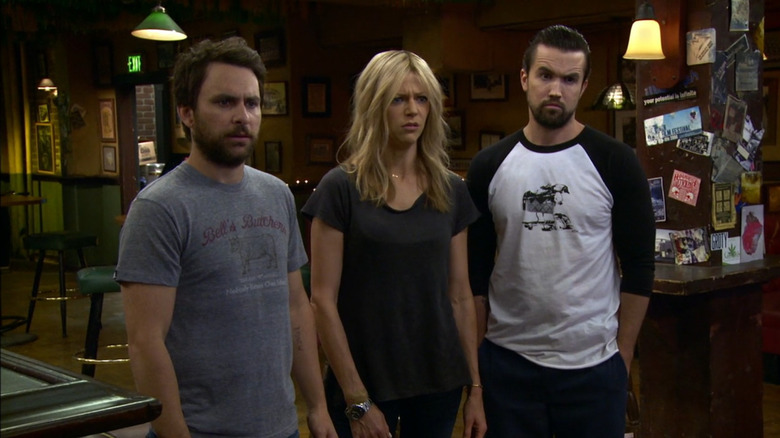 Charlie (Charlie Day), Dee (Kaitlin Olson), and Mac (Rob McElhenney) looking concerned in It's Always Sunny in Philadelphia