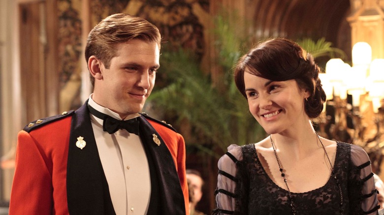 Dan Stevens smiling at Michelle Dockery in Downton Abbey 