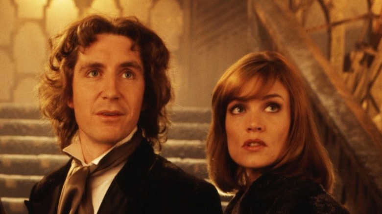 Paul McGann as the Doctor and Grace Holloway as Daphne Ashbrook.Lik
