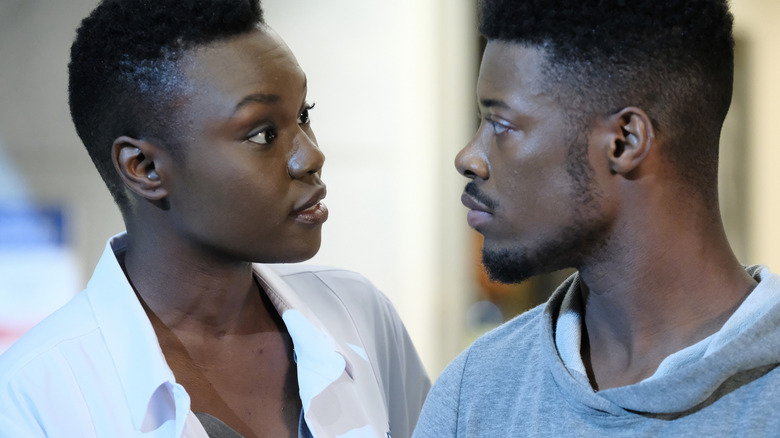 Mina Okafor and Micah having a heated discussion on The Resident