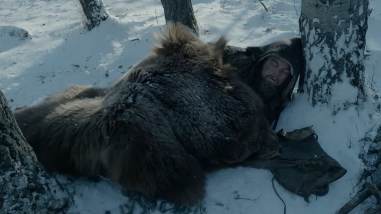 Hugh Glass sleeping before an ambush in The Revenant.