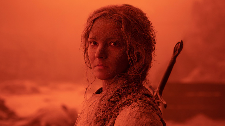 Galadriel standing in a field of corpses and ash in The Lord of the Rings: The Rings of Power