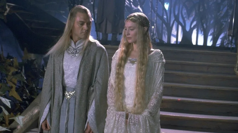 Celeborn and Galadriel walking down some steps in The Lord of the Rings: The Fellowship of the Ring