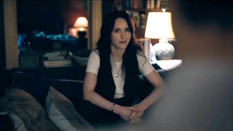 Superman (2025), Lois interviewing Clark/Superman, sitting on the couch