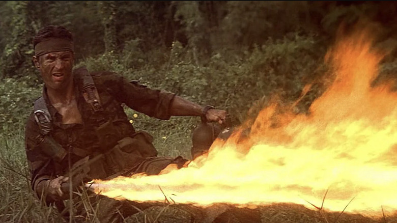 Mike shoots his flamethrower in The Deer Hunter