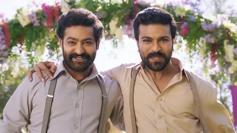 N. T. Rama Rao Jr. and Ram Charan as Komaram Bheem and Alluri Sitarama Raju in RRR