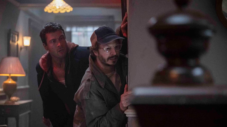 Ben Richards and Elton Parrakis sneak around in The Running Man