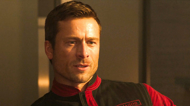 Ben Richards is coiffed and dressed in The Running Man