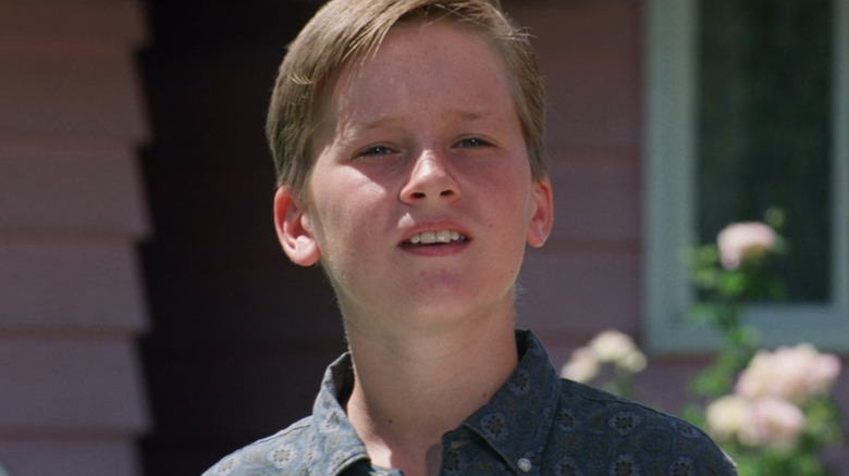 Scotty (Tom Guiry) outside house in The Sandlot