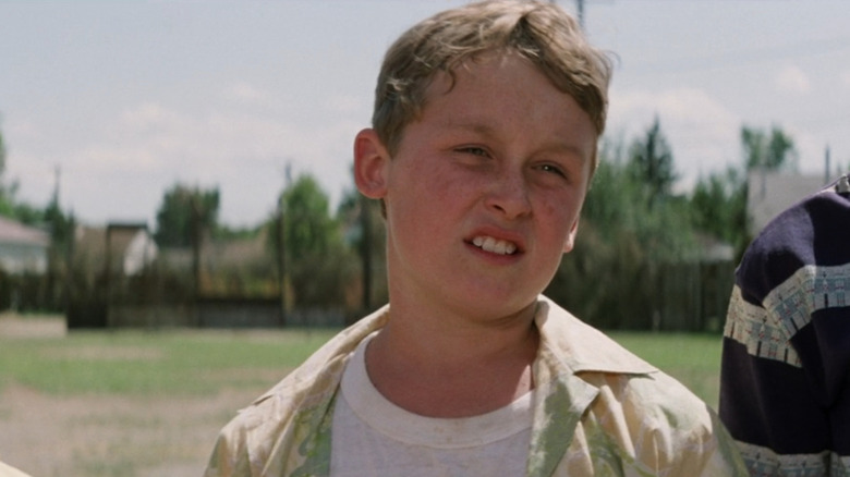 Timmy (Victor DiMattia) explaining something to Scotty in The Sandlot