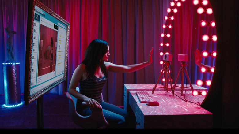 Madeline Brewer as Alice and Lola sets up webcam