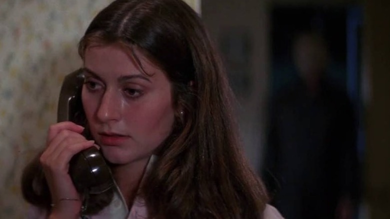 Alice with Michael Myers behind her