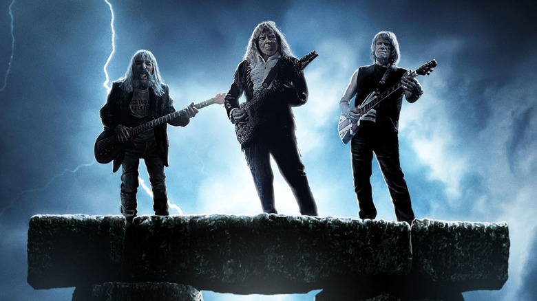 Derek Smalls, David St. Hubbins, and Nigel Tuffnel on Stonehenge on the poster for Spinal Tap II: The End Continues