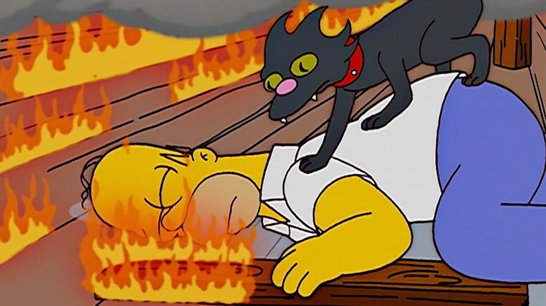 Snowball II waking up Homer during a fire on The Simpsons