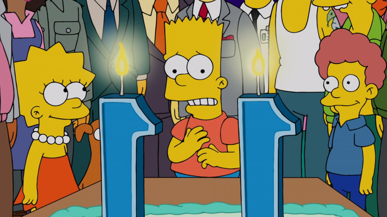 Bart anxiously staring at an 11th birthday cake in The Simpsons