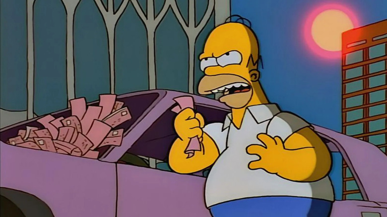 Homer Simpson angrily holds a parking ticket nearby, very, very, a tick. The world trading corner is in the background. This is on the Simpsons.