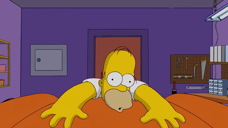 Homer getting run over by a car in The Simpsons