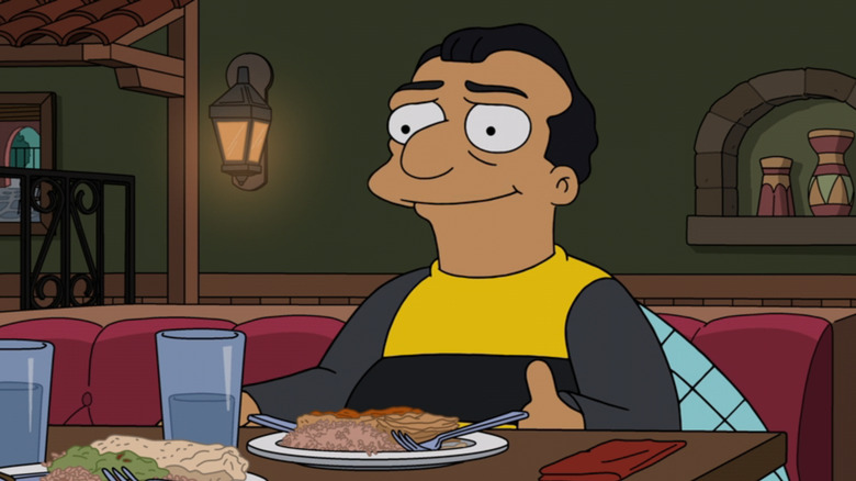 Bumblebee Man not wearing a mask and smiling in The Simpsons