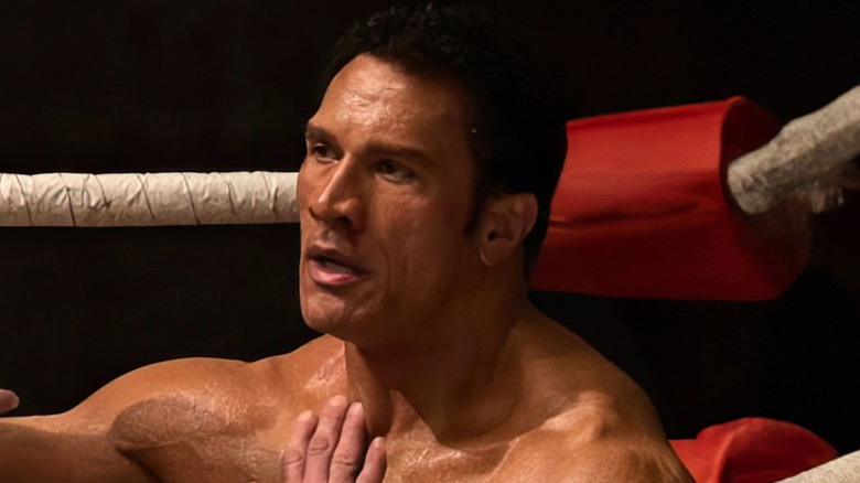 Dwayne Johnson in the role of Marc Care sitting in the corner of the ring in the destroyer