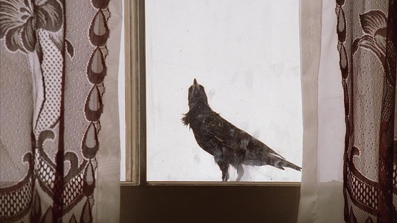 Crow looking through the window during Christopher's made man ceremony on The Sopranos