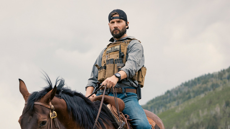 Logan Marshall-Green's Pete Calvin sits on a horse in Marshals