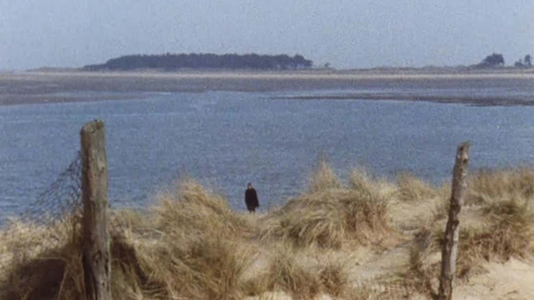 A ghostly guardian watches from afar in A Warning to the Curious