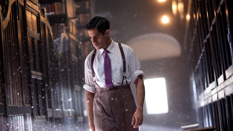 Sacha Dhawan as William Garrett alone in the library in The Tractate Middoth