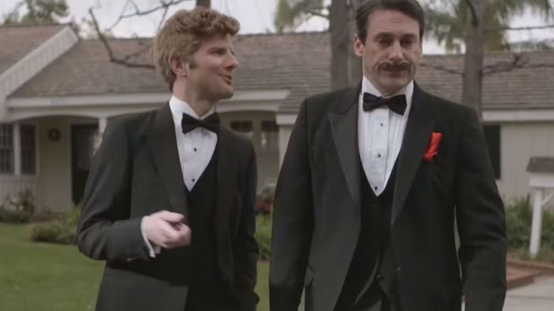 Adam Scott and Jon Hamm in character in a recreation of the opening of Simon & Simon in The Greatest Television Event in History
