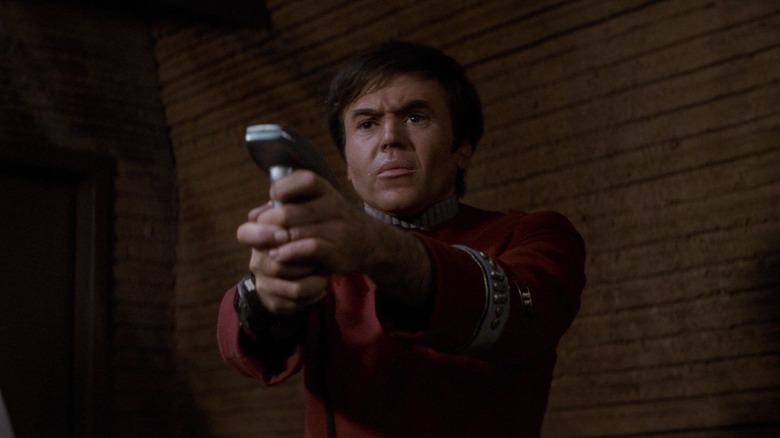 Commander Chekov holding a phaser in Star Trek II: The Wrath of Khan