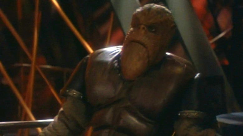 Mark Allen Shepherd as Morn looking very annoyed and shrugging