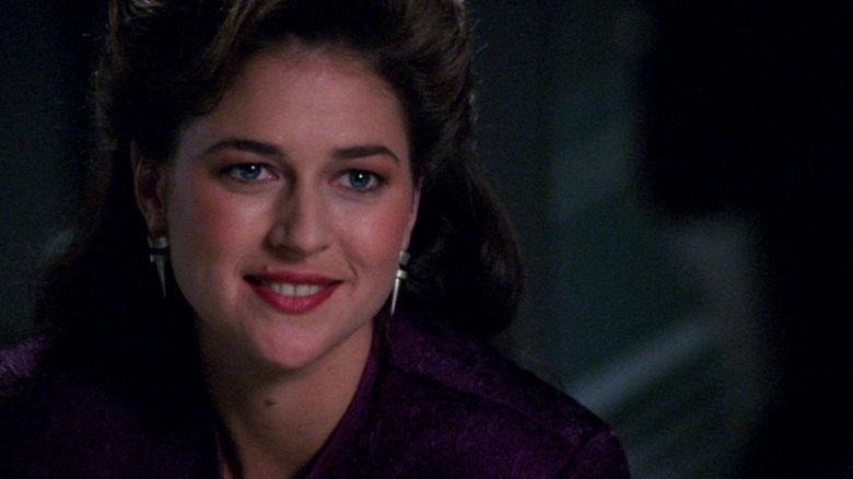Dr. Leah Brahms, smiling at Ten Forward, in Star Trek: The Next Generation