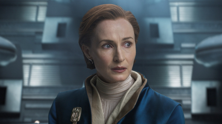 Mon Mothma standing in the Galactic Senate chamber in Andor season 2