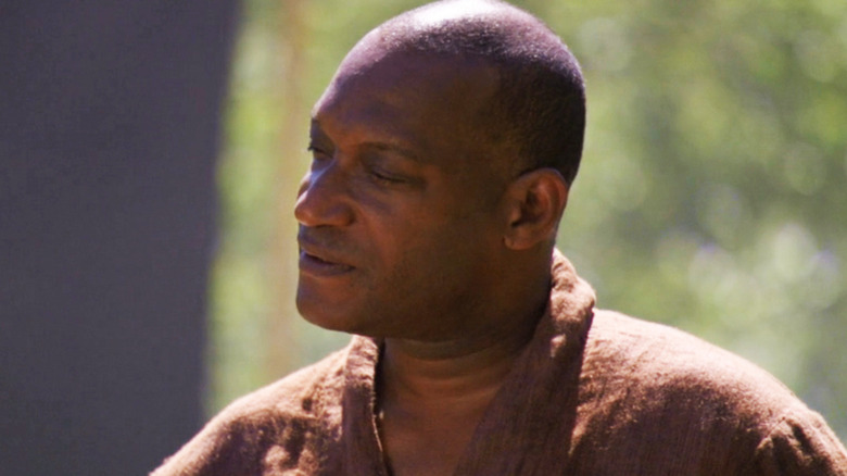 Tony Todd's Lord Haikon looks to his right in Stargate SG-1