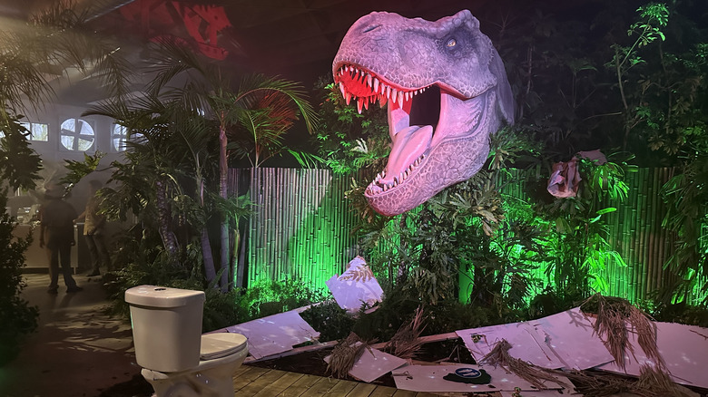 T-rex and toilet at Step into Jurassic Park attraction SDCC