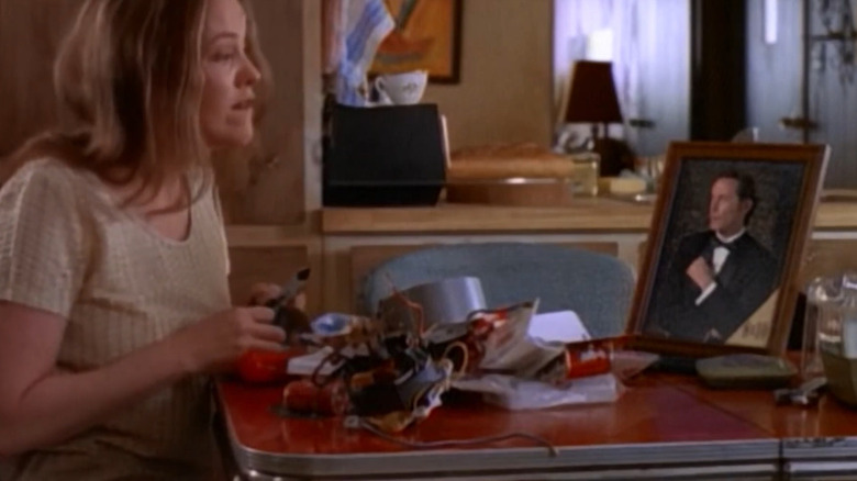 Catherine O'Hara as Becka  Paulson talking to the man in her picture frame in the Outer Limits episode The Revelations of Becka Paulson