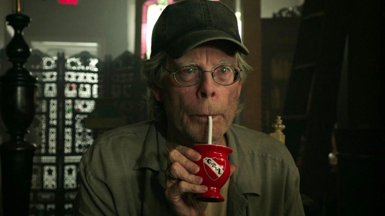Stephen King drinking from a straw in It: Chapter Two